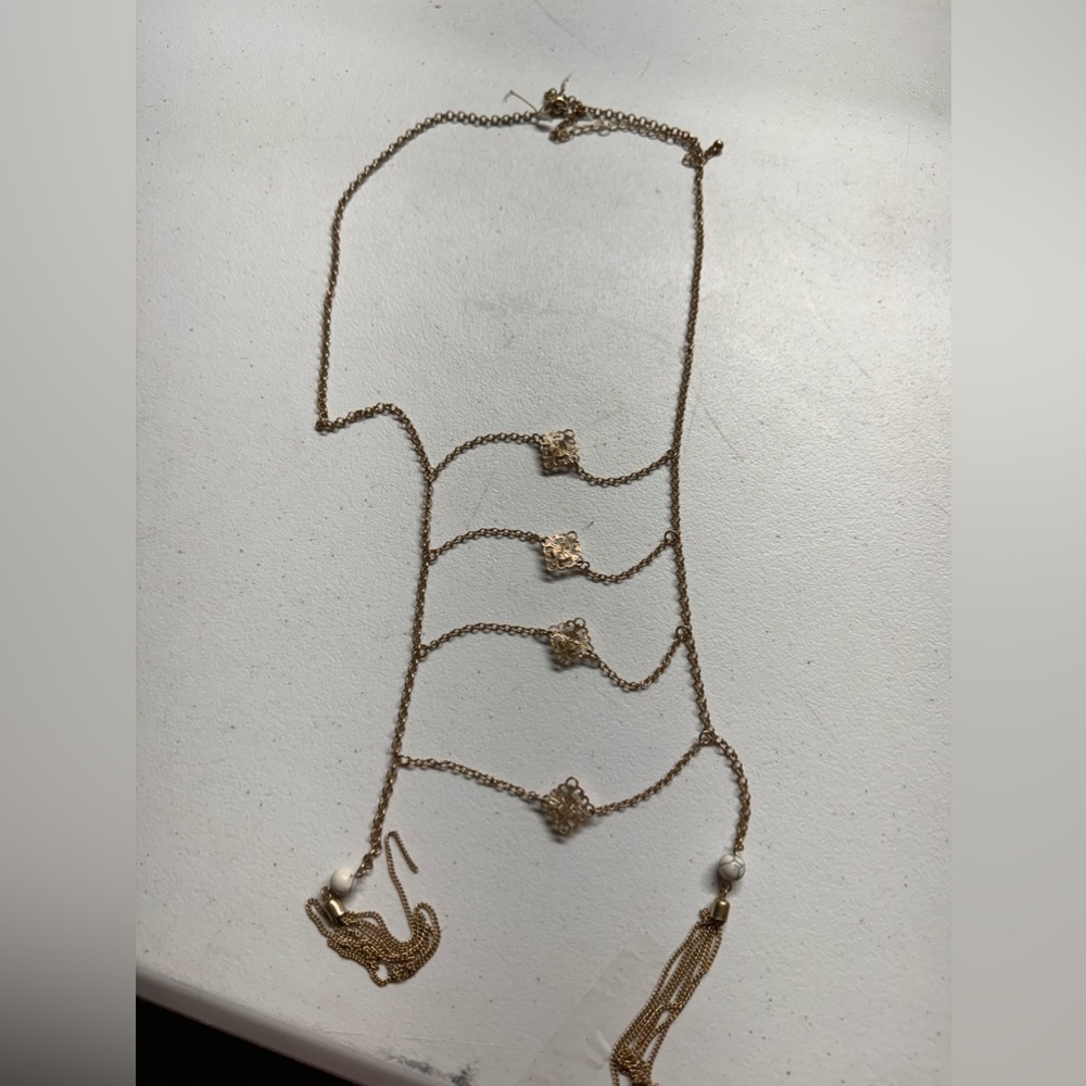 Long classic gold necklace